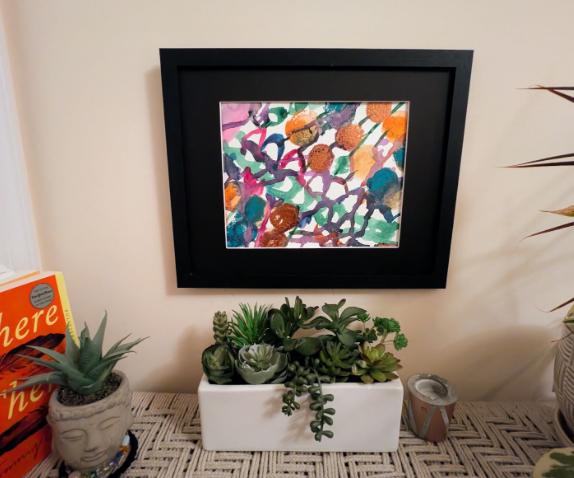 Green and purple lines scattered on white canvas with brown dots.