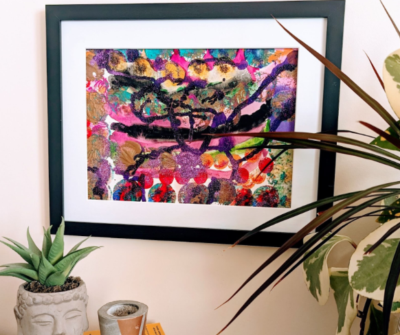 Assortment of colors make up the painting with pink and brown being the main colors.