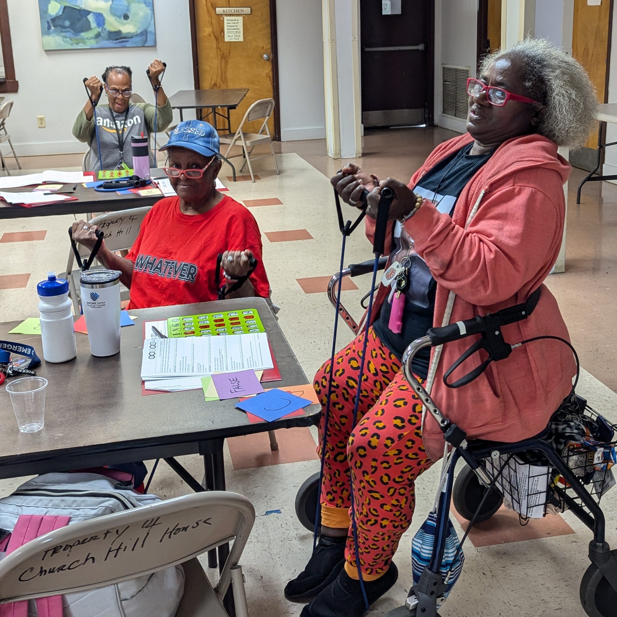 Older lady participants combining exercise with bingo.